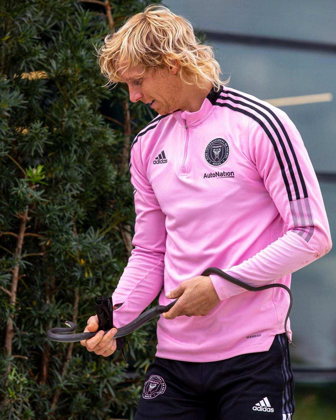 Inter Miami CF veteran defender Brek Shea picks up a snake after training camp at the 50,000-square-foot Inter Miami CF Training Center in Fort Lauderdale, Florida, on Thursday, January 20, 2022. The training center sits adjacent to the Club’s 19,100 capacity DRV PNK Stadium in Fort Lauderdale.