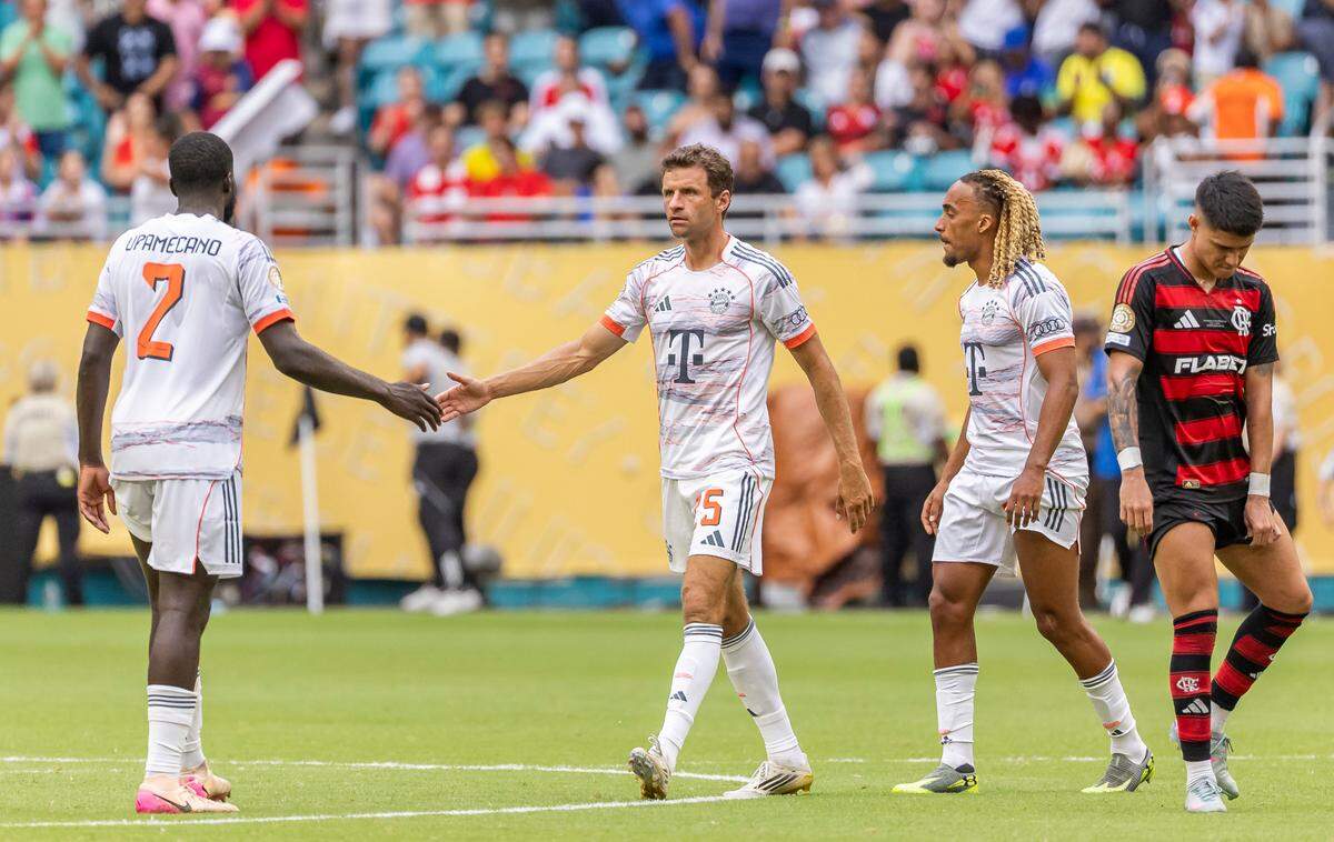 Bayern Munich Forward Thomas Muller (25) celebrates with defender Dayot Upamecano (2) after they defeated Flamengo in the second half of their round of 16 FIFA Club World Cup soccer match at Hard Rock Stadium on Sunday, June 29, 2025, in Miami Gardens, Fla.