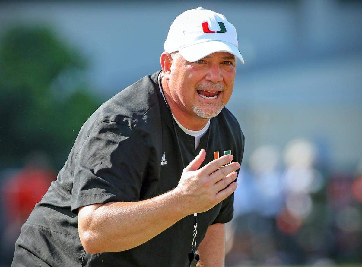 Miami Hurricanes defensive coordinator Lance Guidry works with players during football practice at the University of Miami’s Greentree Field on Tuesday, March 7, 2023.