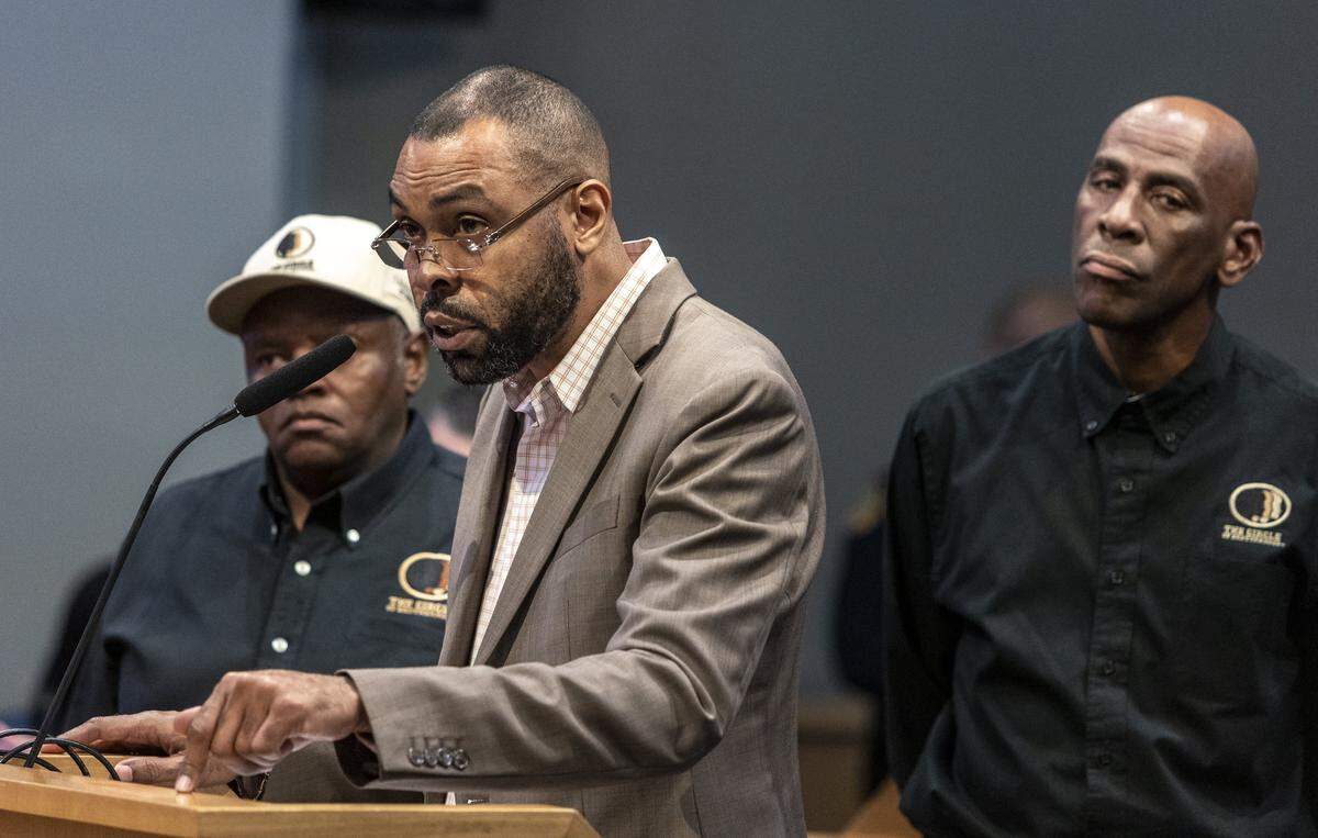 Miami FL- January 12, 2023 - Patrick Range, center, speaks to the City of Miami Commissioners during a Commission meeting.