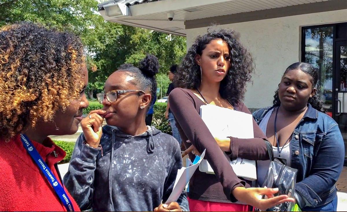 Taravella High students - Aaliyah Pierre, 16, left, Armoni Stanley, 17, Leona Foster, 16, and Kaia Way, 17, right, all agree that police reaction was extreme after BSO Deputy arrested Tarvella High teenager, DeLucca Rolle, and smashed his head to the ground.