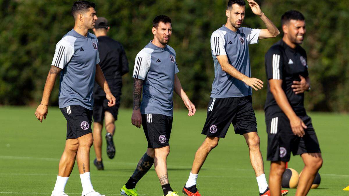 Inter Miami CF players Luis Suárez, Lionel Messi, and Sergio Busquets walk out with the team during training camp at the Florida Blue Training Center in Fort Lauderdale, Florida, on Saturday, January 13, 2024.
