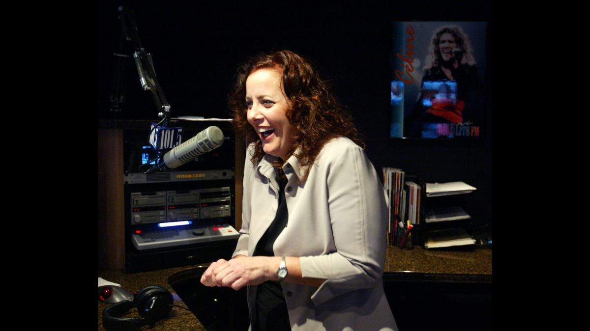 In 2003, radio DJ Kimba was at LITE FM that, at the time, become the first all -female radio station in South Florida. In this file photo Kimba shares a laugh with a listener during her show. Before she went to the soft rock station she was spinning what is now classic rock at the former Zeta 4.