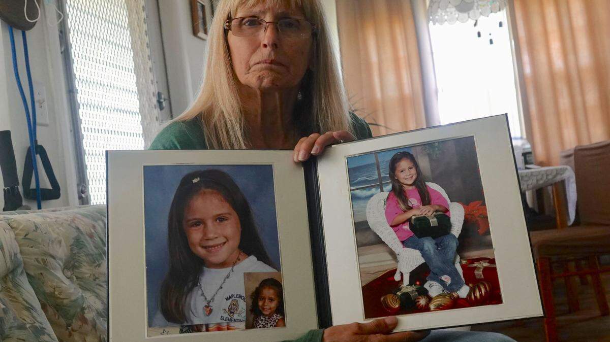 Barbara Lechler of Deerfield Beach with photos of her granddaughter, Ivy Marie Bedell on Thursday, January 5, 2023. Ivy, a victim of sex trafficking whose body was found along Interstate 75 in western Broward County on Wednesday, Jan. 4, 2023.