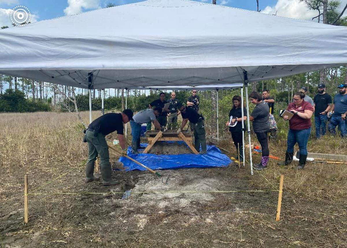A shallow grave with human remains was found March 11, 2022, in the Hungryland Wildlife and Environmental Area in Martin County. The grave was found close to where body parts were located by the banks of an alligator-infested canal earlier in the week, the Martin County Sheriff’s Office said.