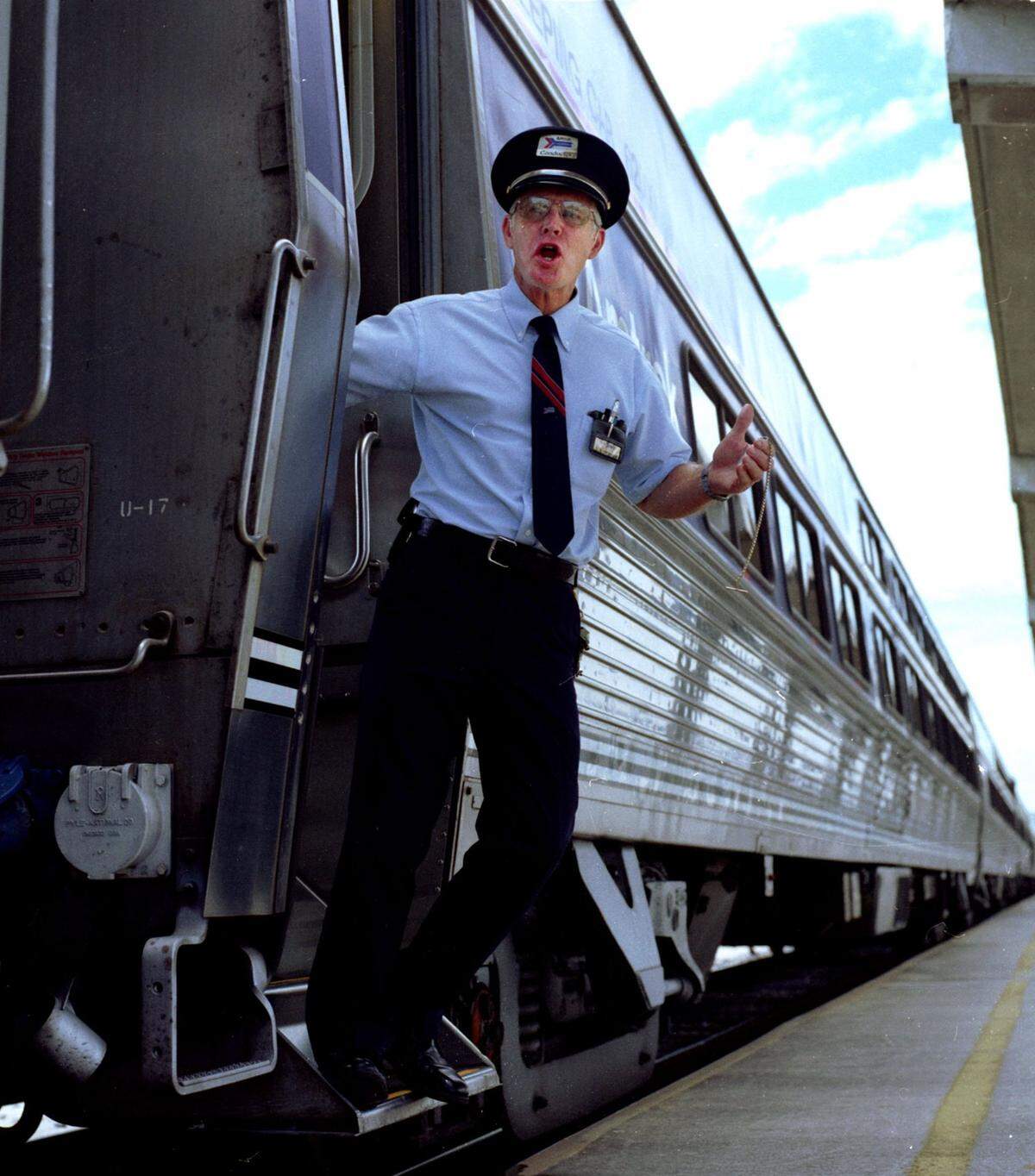 Amtrak Conductor Larry Crenshaw calls “ALL ABOARD” the 10:35am Silver Star to New York leaving from Hialeah.