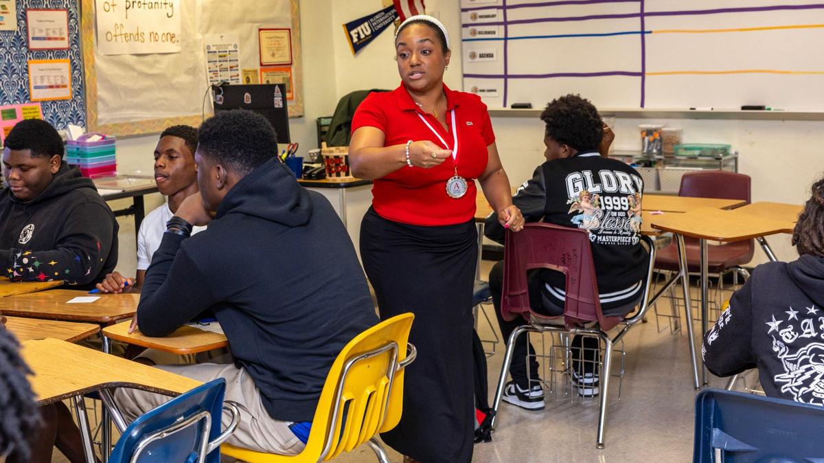 An English teacher speaks with her students during the first day of school at Miami Edison High on Thursday, August 15, 2024, in Miami, Fla.