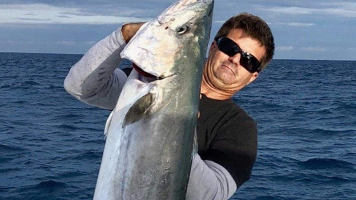 Capt. Casey Hunt of Key West with a 60-pound kingfish that he caught in January.