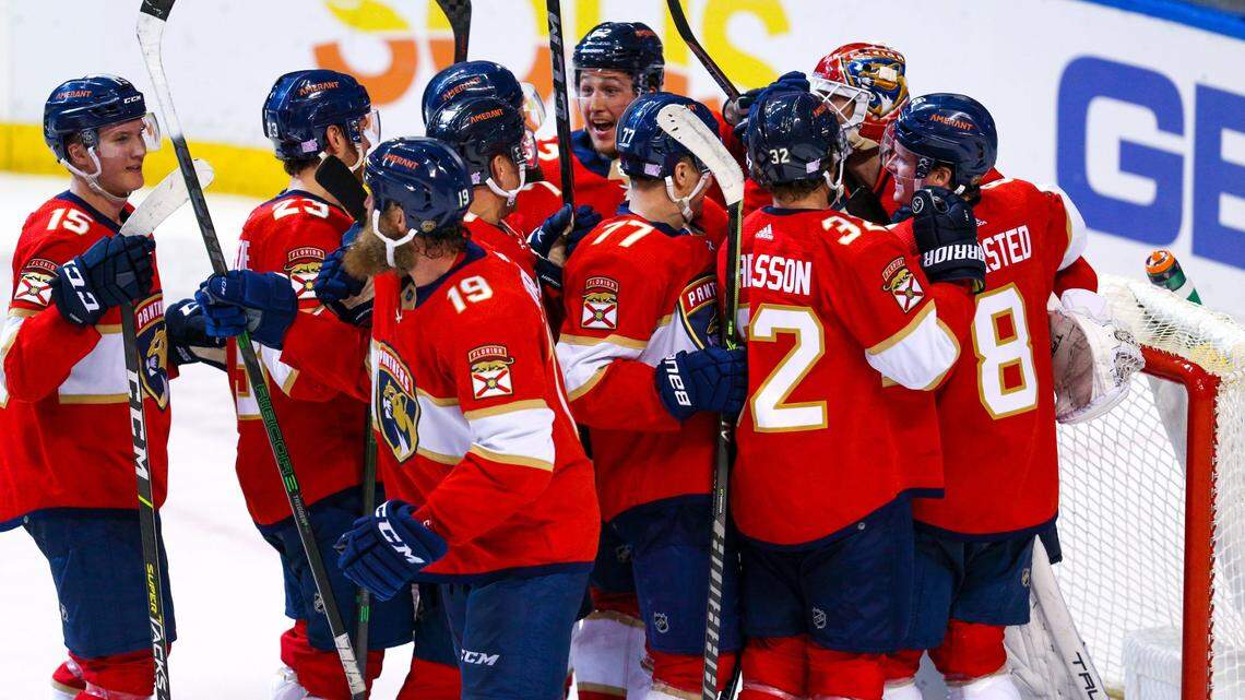 Florida Panthers swarm goaltender Sergei Bobrovsky (72) after defeating the Washington Capitals 5-4 after the third period of an NHL game at FLA Live Arena in Sunrise, Florida, on Tuesday, November 30, 2021.
