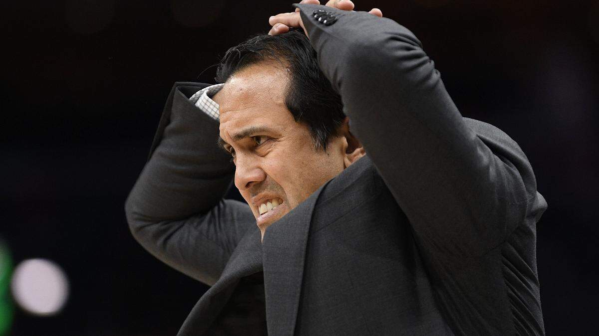 Miami Heat head coach Erik Spoelstra reacts to a foul on his team during the second half of an NBA basketball game against the Washington Wizards, Monday, Dec. 30, 2019, in Washington. (AP Photo/Nick Wass)