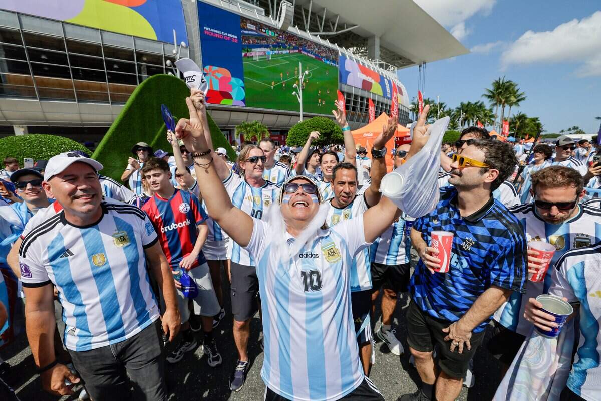 Team Argentina fan Gustavo Dos Reys, reacts in front of the soccer ball before the start of the FIFA World Cup 2026 Round of 32 soccer match between Argentina and Cape Verde at Hard Rock Stadium (Miami Stadium) on Friday, July 3, 2026, in Miami Gardens, Fla.