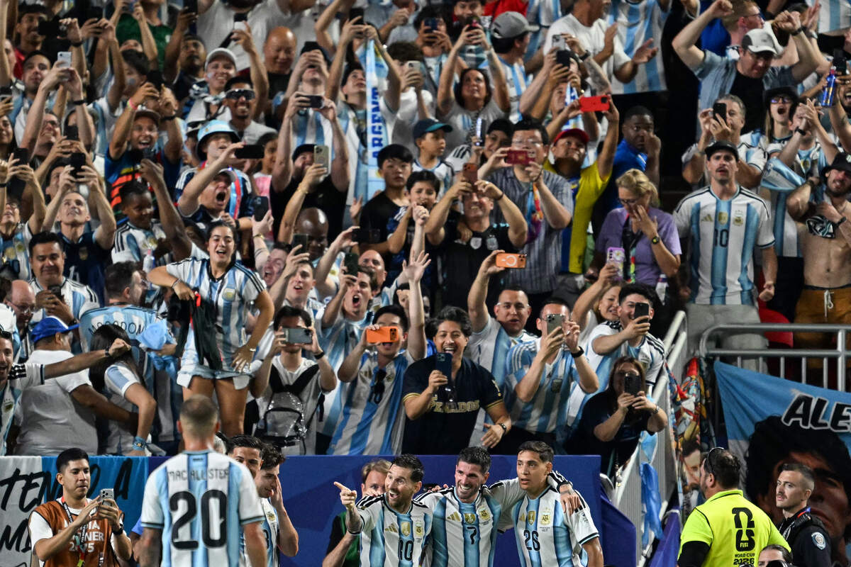 Argentina's forward #10 Lionel Messi celebrates with teammates celebrates scoring his team's third goal during the 2026 World Cup Group J football match between Argentina and Algeria at the Kansas City Stadium in Kansas City on June 16, 2026.  (Photo by ROBERTO SCHMIDT / AFP via Getty Images)