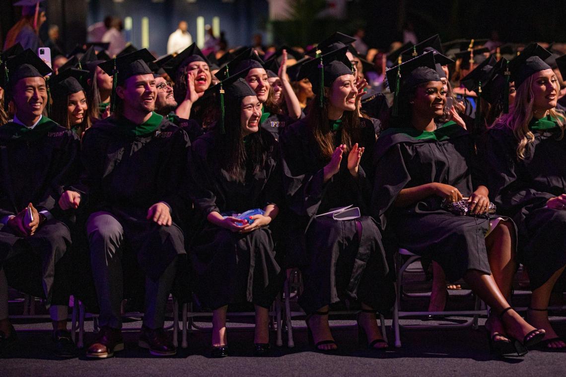 FIU graduates react during commencement at the Ocean Bank Convocation Center in Miami on Tuesday, Dec. 13, 2022.