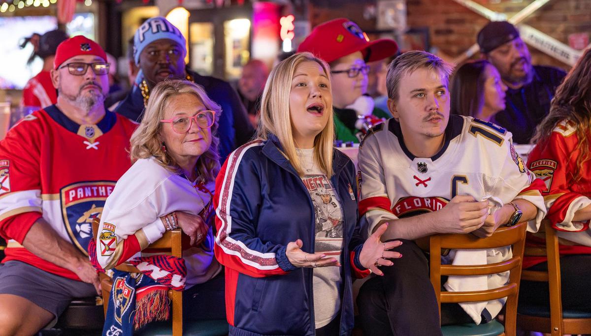 From left to right: Florida Panthers fans Cheryl Hernandez, Kristen Knowles, and Chris Miller, react after the Edmonton Oilers scored against their team in Game 2 of the NHL Stanley Cup Final at the Inn Field Bar & Grill on Friday, June 6, 2025, in Sunrise, Fla.