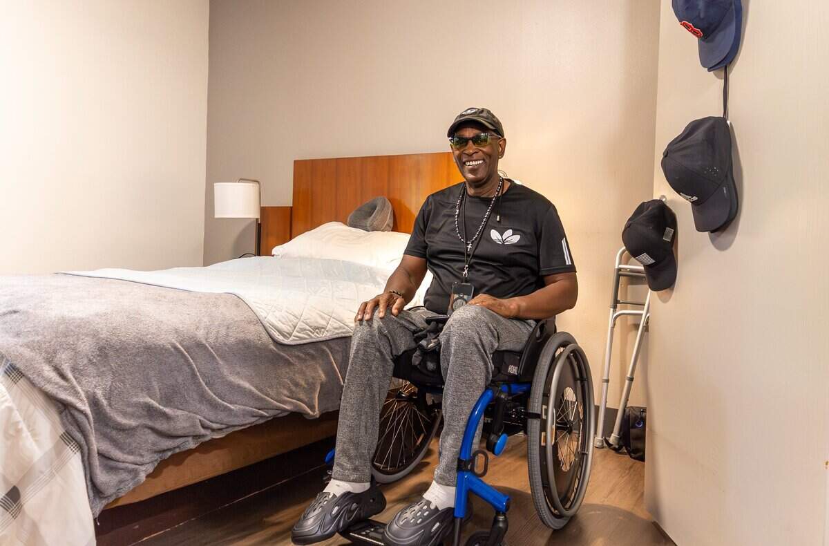 Dean Cole, 69, is pictured in his wheelchair in the middle of his room at Miami-Dade Homeless Trust's Hideaway Bay in Cutler Bay, Fla., on Tuesday, June 30, 2026. The residence is home to 93 residents, who pay 30% of their income toward rent and receive housing, meals, and wraparound social services. The program aims to provide stability, dignity, support, and long-term care.