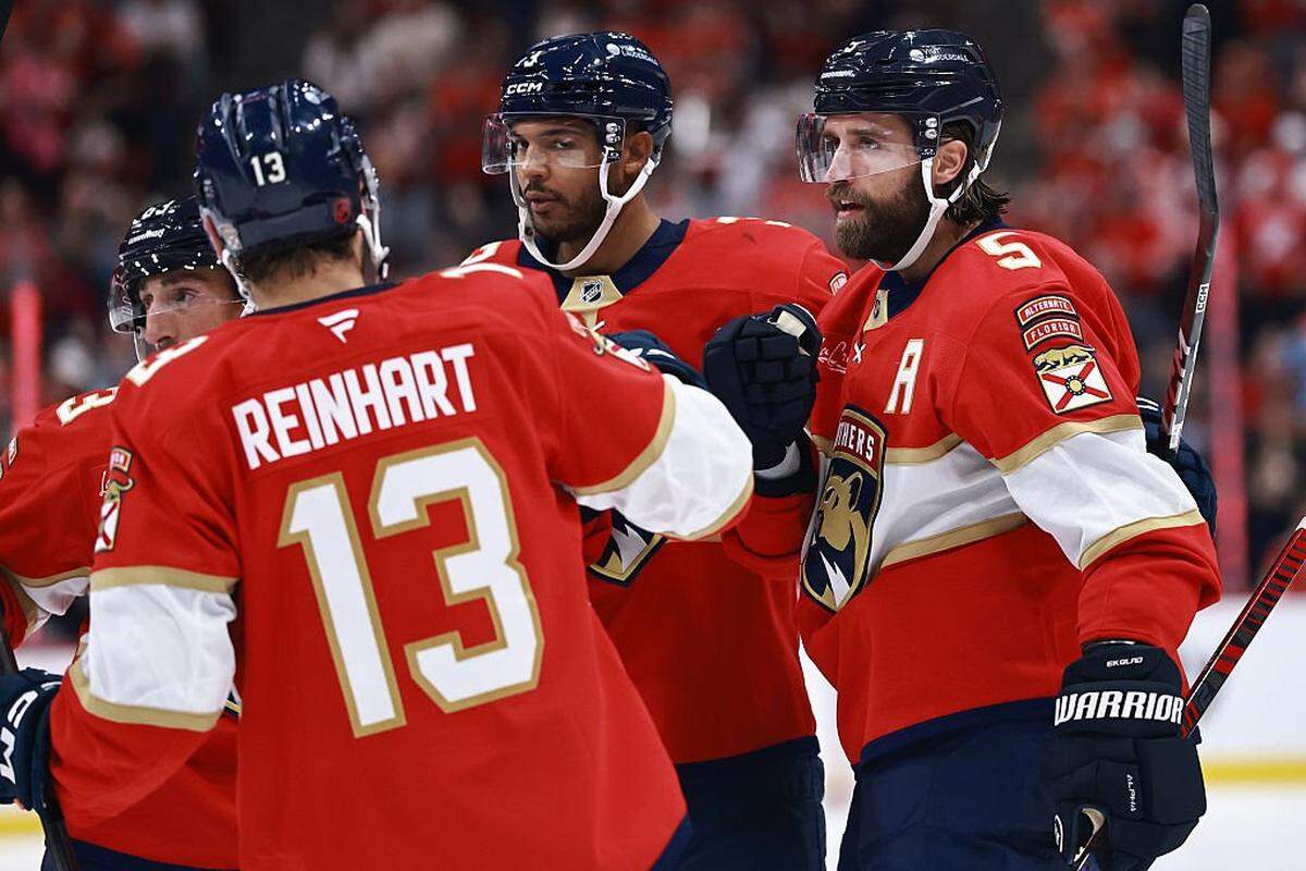 SUNRISE, FLORIDA - OCTOBER 11: Aaron Ekblad #5 of the Florida Panthers celebrates his goal with Seth Jones #3 of the Florida Panthers against the Ottawa Senators during the second period at Amerant Bank Arena on October 11, 2025 in Sunrise, Florida. (Photo by Carmen Mandato/Getty Images)
