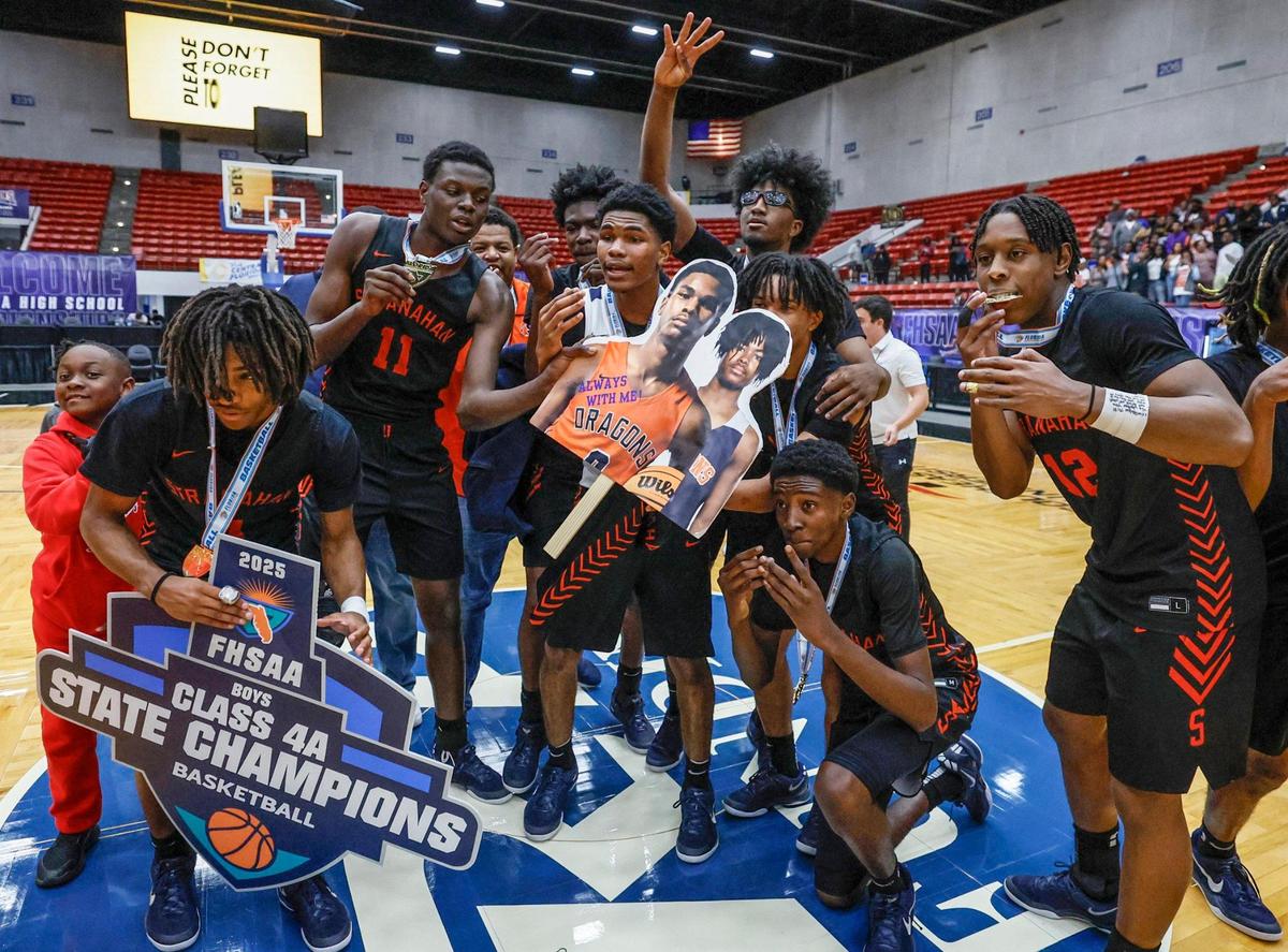 Stranahan High School players celebrate the win over Gibbs High School in the FHSAA Class 4A Boys High School Basketball State Championship at the RP Funding Center in Lakeland, Florida on Thursday, March 6, 2025.