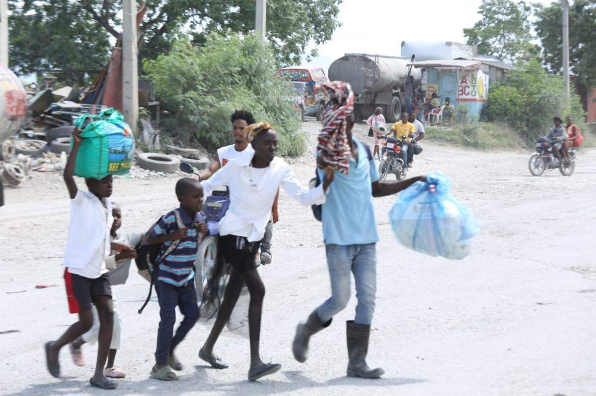 An ongoing gang war in Port-au-Prince forced residents in the Cul-de-Sac to abandon their homes and flee to safety on Monday, May 11, 2026. The vast plain is home to rival armed groups fighting for control of the area. Doctors Without Borders/Médecins Sans Frontières said its staff was forced to evacuate and suspend operations at its hospital in the Cité Soleil neighborhood of Port-au-Prince after more than 24 hours of heavy clashes between armed groups.