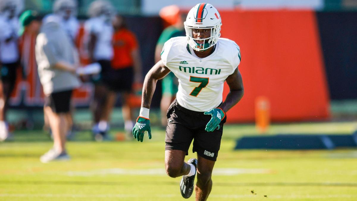 Miami Hurricanes defensive back Davonte Brown (7) runs on the field during football practice at the University of Miami campus in Coral Gables, Florida, Tuesday, April 4, 2023.