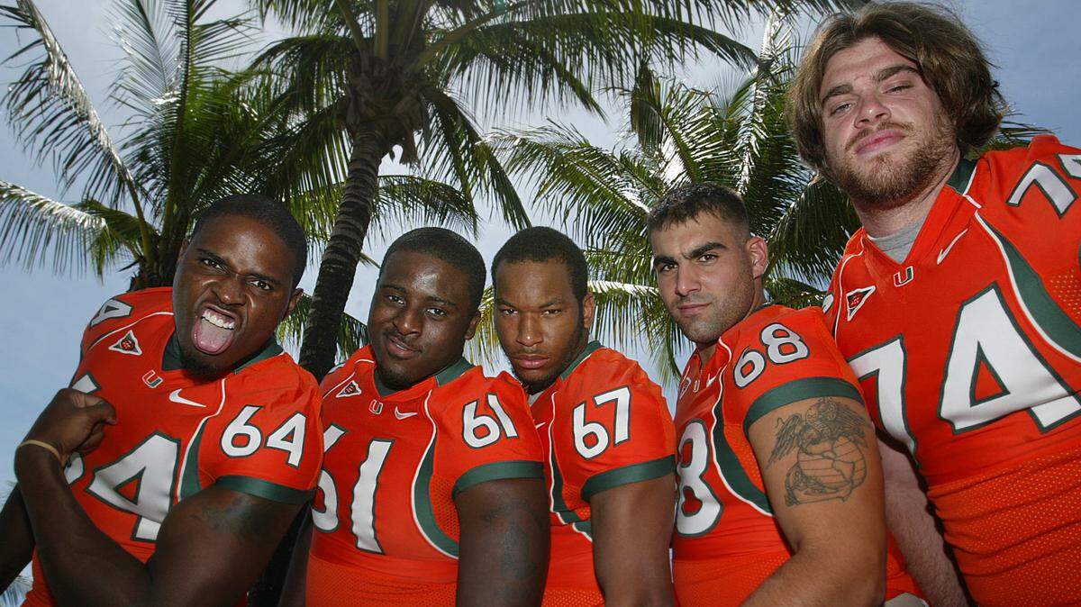 FOR SPORTS -- 8/8/2005 -- UM OFFENSIVE LINE FOR SPECIAL SECTION -- MIAMI HERALD STAFF PHOTO BY CHUCK FADELY -- The University of Miami offensive line: l-r: Rashad Butler, Tony Tella, Tyrone Byrd, Tyler McMeans, and Eric Winston pose Monday, August 8, 2005. They were there for the University of Miami football team media day at the Coral Gables school. for susan miller degnan story