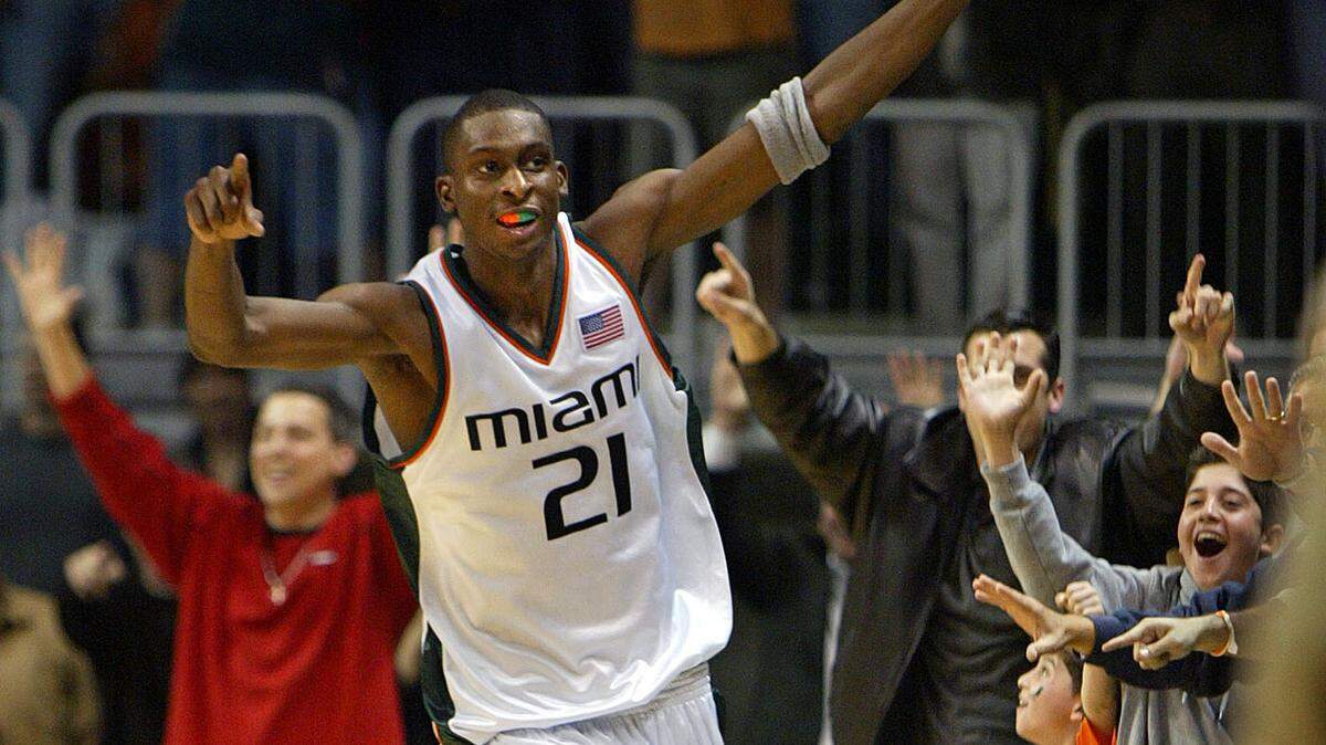 The University of Connecticut vs The University of Miami at the Convocation Center in Coral Gables. UM’s Darius Rice celebrates on the court after stealing the ball sinking a three pointer to win the game 77-76 on Jan. 20, 2003