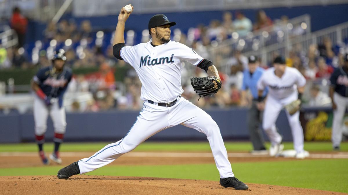 Miami Marlins starting pitcher Héctor Noesí (48) pitches to Atlanta Braves second baseman Ozzie Albies (1) in the first inning as the Miami Marlins host the Atlanta Braves at Marlins Park in Miami, Florida on Sunday, August 11, 2019.