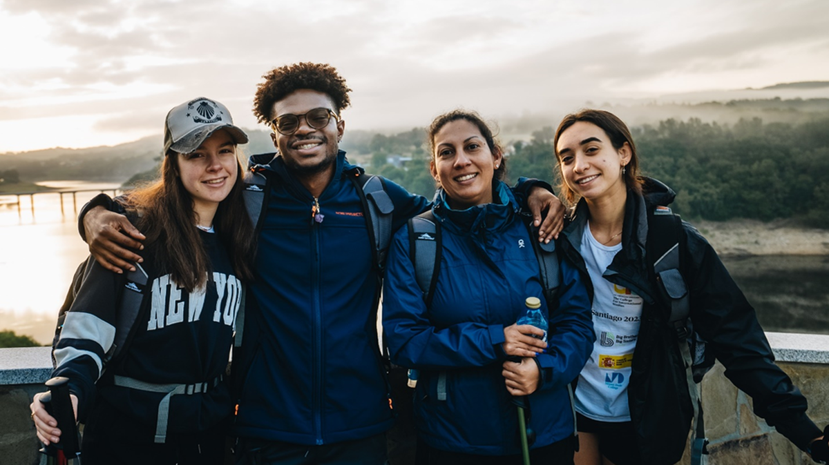 Left to right, Miami students Emilee Garcia, Nathaniel Forbes, Vanessa Lopez and Megan di Russo on the bridge over the Miño River in Galicia, Spain.