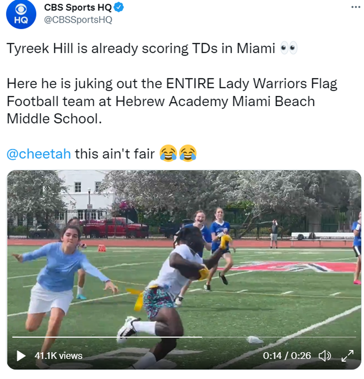 Dolphins wide receiver Tyreek Hill is seen in this screenshot running past the Hebrew Academy Middle School girls flag football team in Miami Beach.