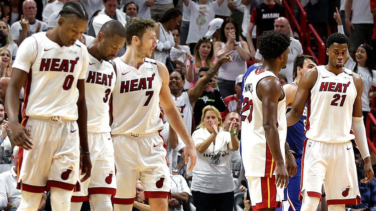 Heat-from left- Josh Richardson, Dwyane Wade, Goran Dragic, Justice Winslow and Hassan Whiteside react as Philadelphia leads in the fourth quarter of the playoff: round 1 game 4 between the Miami Heat and the Philadelphia 76ERS, at AmericanAirlines Arena in Miami on Saturday, April 21, 2018.