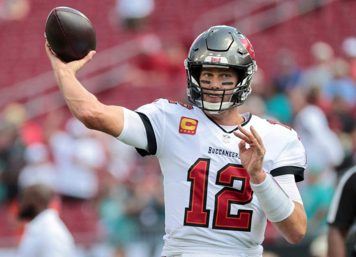 Tampa Bay Buccaneers quarterback Tom Brady (12) warms up before the game against the Miami Dolphins at Raymond James Stadium in Tampa on Sunday, October 10, 2021.
