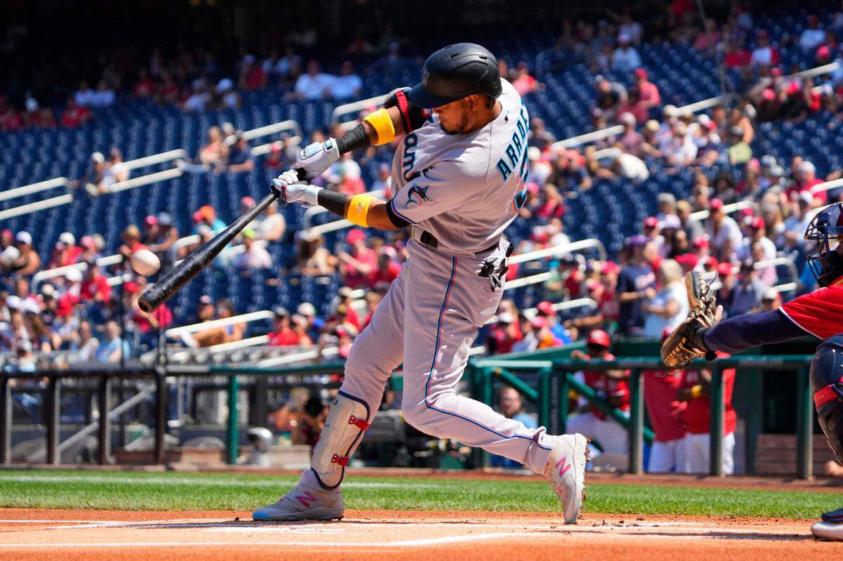 Sep 3, 2023; Washington, District of Columbia, USA; Miami Marlins second baseman Luis Arraez (3) hits a home run against the Washington Nationals during the first inning at Nationals Park.