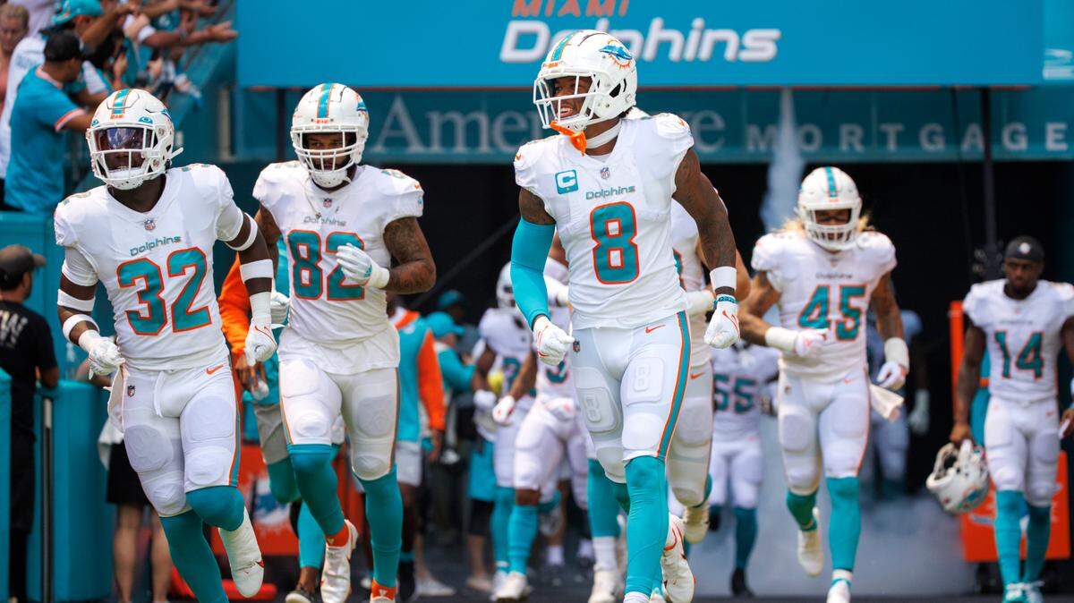 Miami Dolphins safety Jevon Holland (8) takes the field with his teammates before the start of an NFL football game against the New England Patriots at Hard Rock Stadium on Sunday, September 11, 2022 in Miami Gardens, Florida.