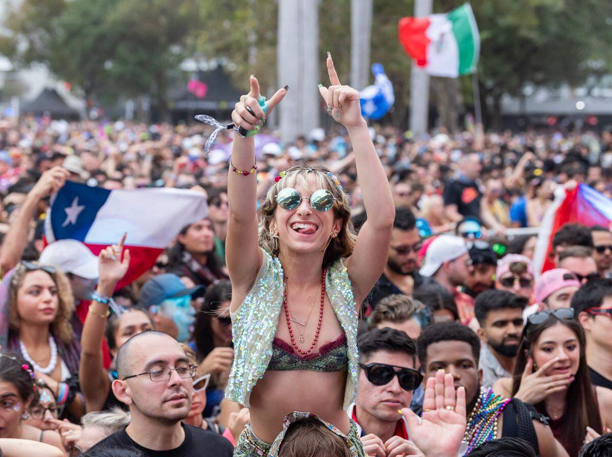 Attendees dance as Armin van Buuren performs during Ultra Music Festival’s 25th anniversary at Bayfront Park on Saturday, March 29, 2025, in downtown Miami, Fla.