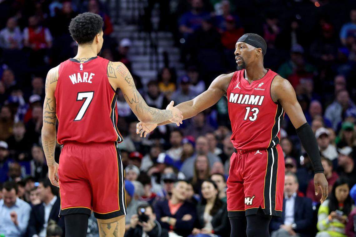 Bam Adebayo #13 high fives Kel'el Ware #7 of the Miami Heat during the first half against the Philadelphia 76ers at the Wells Fargo Center on February 05, 2025 in Philadelphia.