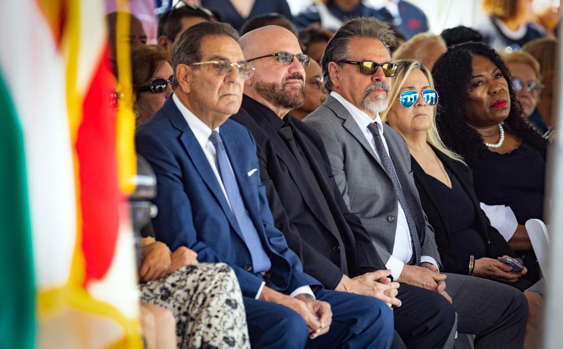 Left to right: former Miami Mayor Xavier Suarez, Commissioner Damian Pardo, Commissioner Miguel Angel Gabela and his wife Mariela, and city employee Gail Seay, who sang a rendition of Frank Sinatra’s “My Way,” shown seated during a memorial service at Miami City Hall for Commissioner Manolo Reyes in Miami on Wednesday, April 16, 2025.