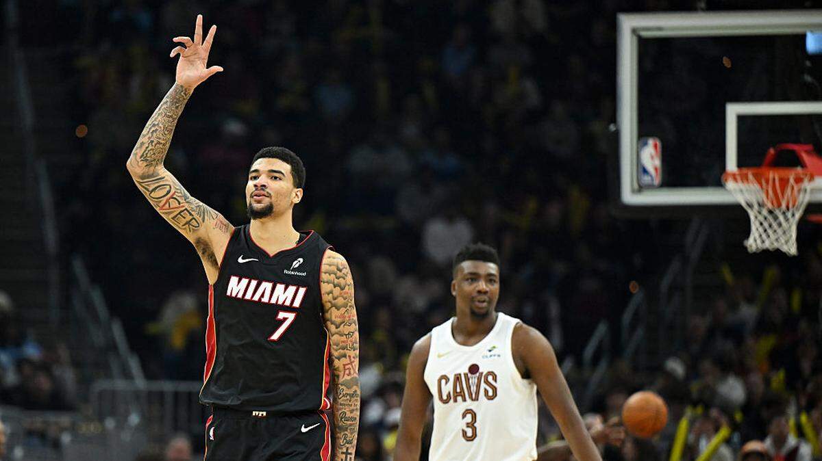 Kel'el Ware #7 of the Miami Heat celebrates making a three-point basket during the second half against the Cleveland Cavaliers at Rocket Arena on March 25, 2026 in Cleveland, Ohio.
