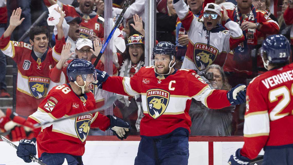 Florida Panthers center Aleksander Barkov (16) celebrates with his teammates after scoring against Carolina Hurricanes goaltender Pyotr Kochetkov (52) in the third period of Game 3 during the Eastern Conference final of the NHL Stanley Cup playoffs at Amerant Bank Arena on Saturday, May 24, 2025, in Sunrise, Fla.