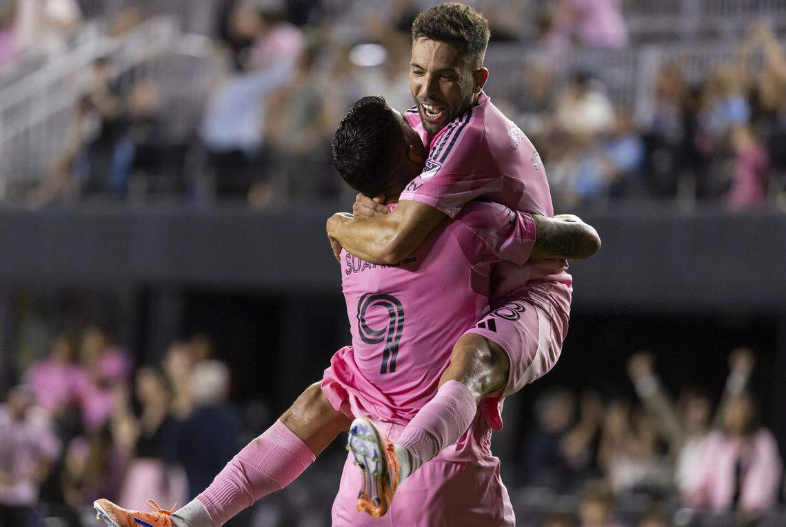 Inter Miami forward Luis Suárez (9) celebrates with defender Jordi Alba (18) after scoring a goal against the Chicago Fire in the second half of their MLS match at Chase Stadium on Tuesday, Sept. 30, 2025, in Fort Lauderdale, Fla.