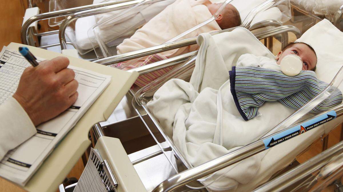 FILE - This Feb. 16, 2017 file photo shows newborn babies in the nursery of a postpartum recovery center in upstate New York. (AP Photo/Seth Wenig, File)