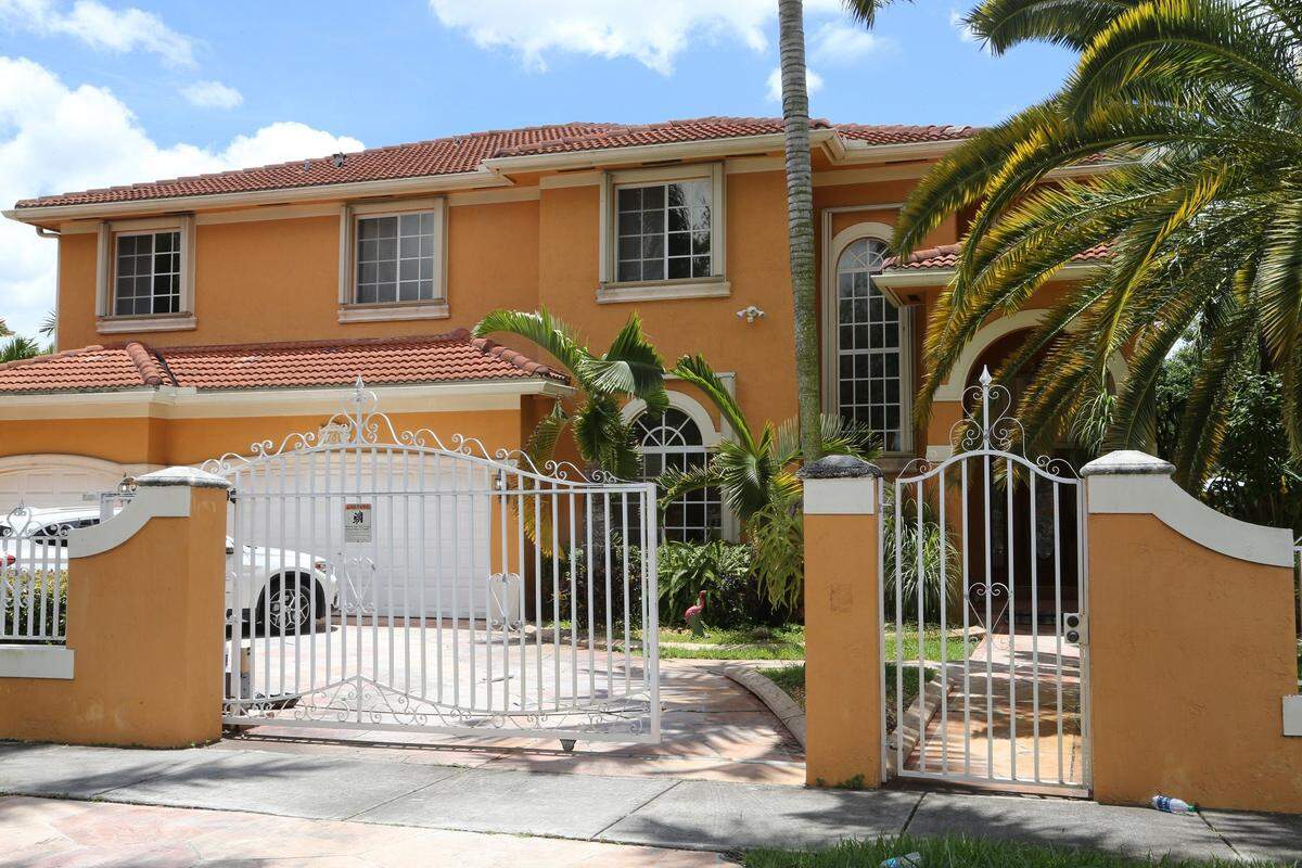 Miami-Dade police detectives raided the home of a suspected marijuana trafficker at 7780 NW 169TH Terr., Miami Lakes, and discovered at least $24 million in cash the largest money seizure in the department's history, July 29, 2016.