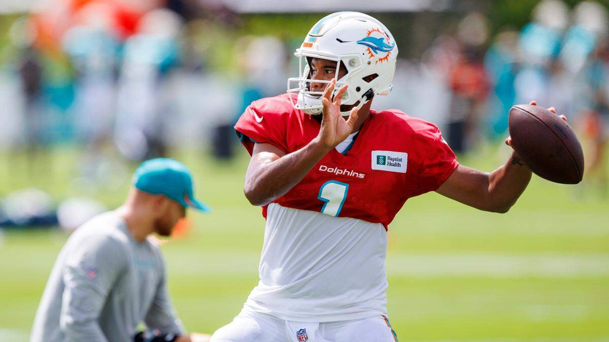 Miami Dolphins quarterback Tua Tagovailoa (1) sets up to pass during NFL football training camp at Baptist Health Training Complex in Hard Rock Stadium on Tuesday, August 2, 2022 in Miami Gardens, Florida.