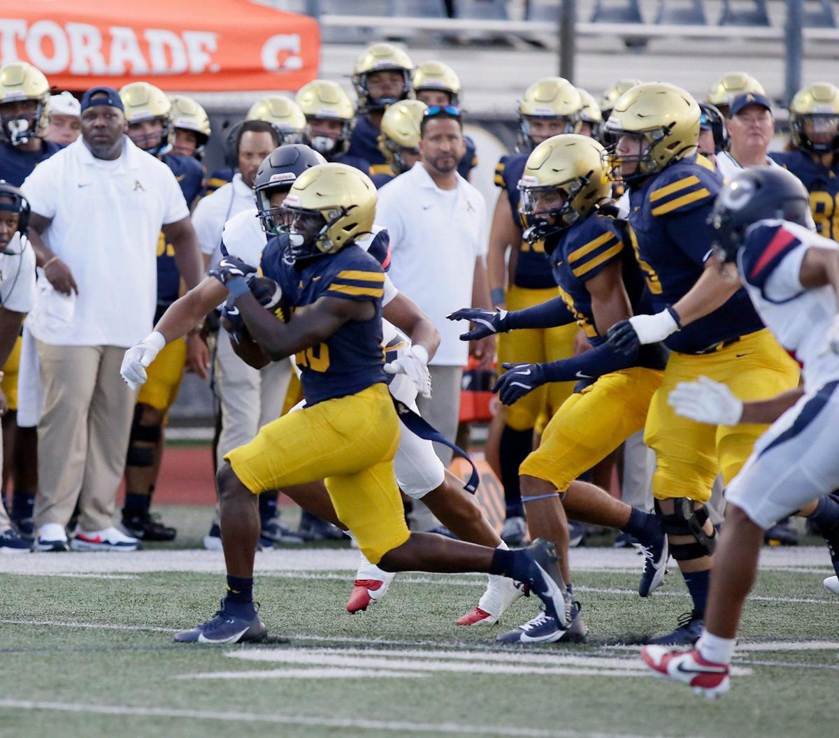 St. Thomas Aquinas Raiders running back Virgil Lemons (28) runs the ball against Columbus Explorers during football game on Friday, September 6, 2024 at St. Thomas Aquinas HS in Fort Lauderdale.