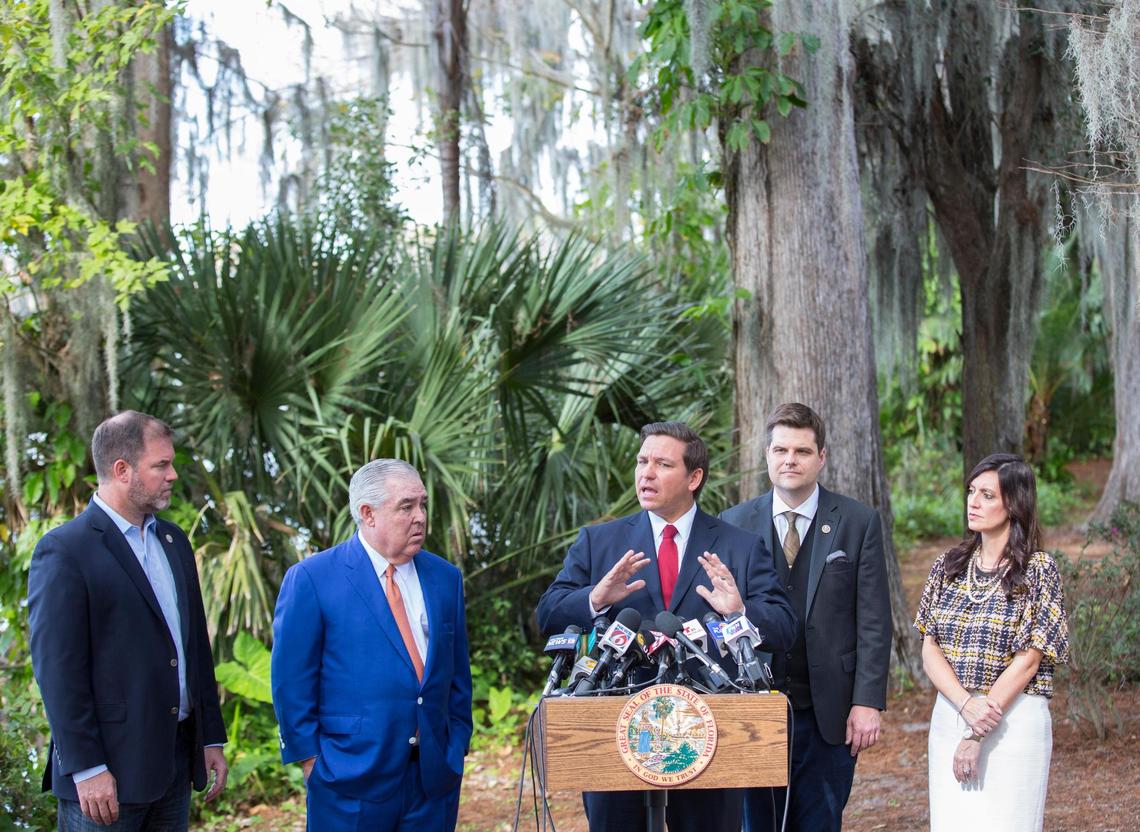 Governor Ron DeSantis, Center speaks at his press conference on his plant to pressure state legislators and give them a mid-March deadline to repeal a law that prohibits smokable forms of medical marijuana at Kraft Azalea Garden in Winter Park, Fla., Thursday, Jan. 17, 2019. (Left to Right) Winter Park Mayor Steve Leary, John Morgan, U.S. Congressman Matt Gaetz and Lieutenant Governor Jeanette Nunez.