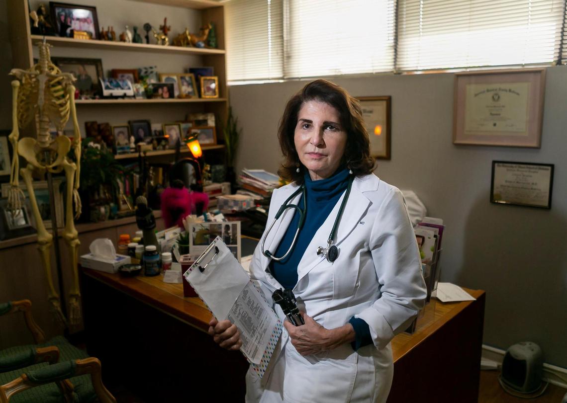 Dr. Linda Marraccini is photographed inside her medical office in South Miami on Sept. 3, 2021. Marraccini has given her patients until Sept. 15 to get vaccinated against COVID-19, or else she’s ending the patient relationship.