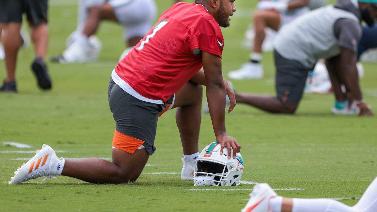 Dolphin quarterback Tua Tagovailoa, stretches out with teammates. On Tuesday, May 17, 2022, Dolphins gave media the availability to video and photograph players during light practice and stretching sessions at the Baptist Health Training Complex at Hard Rock Stadium in Miami Gardens, Florida.
