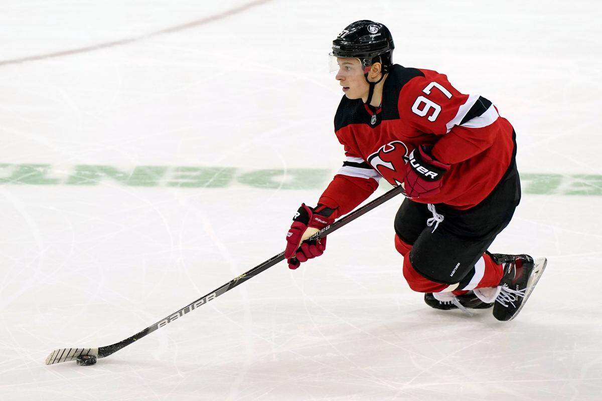 New Jersey Devils left wing Nikita Gusev (97) skates with the puck during the first period of an NHL hockey game, Sunday, March 14, 2021, in Newark, N.J. (AP Photo/Kathy Willens)
