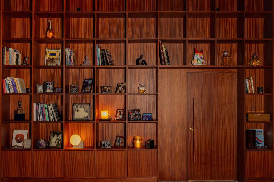 Part of the floor-to ceiling bookshelf that takes up one of the walls at Fooq’s restaurant in Little River.