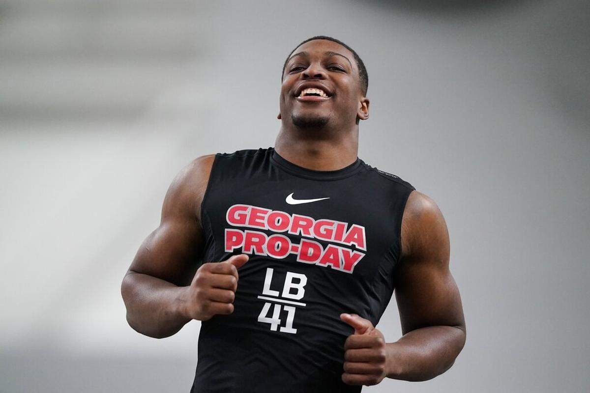 Channing Tindall runs football drills during Georgia’s Pro Day on Wednesday, March 16, 2022, in Athens, Ga.