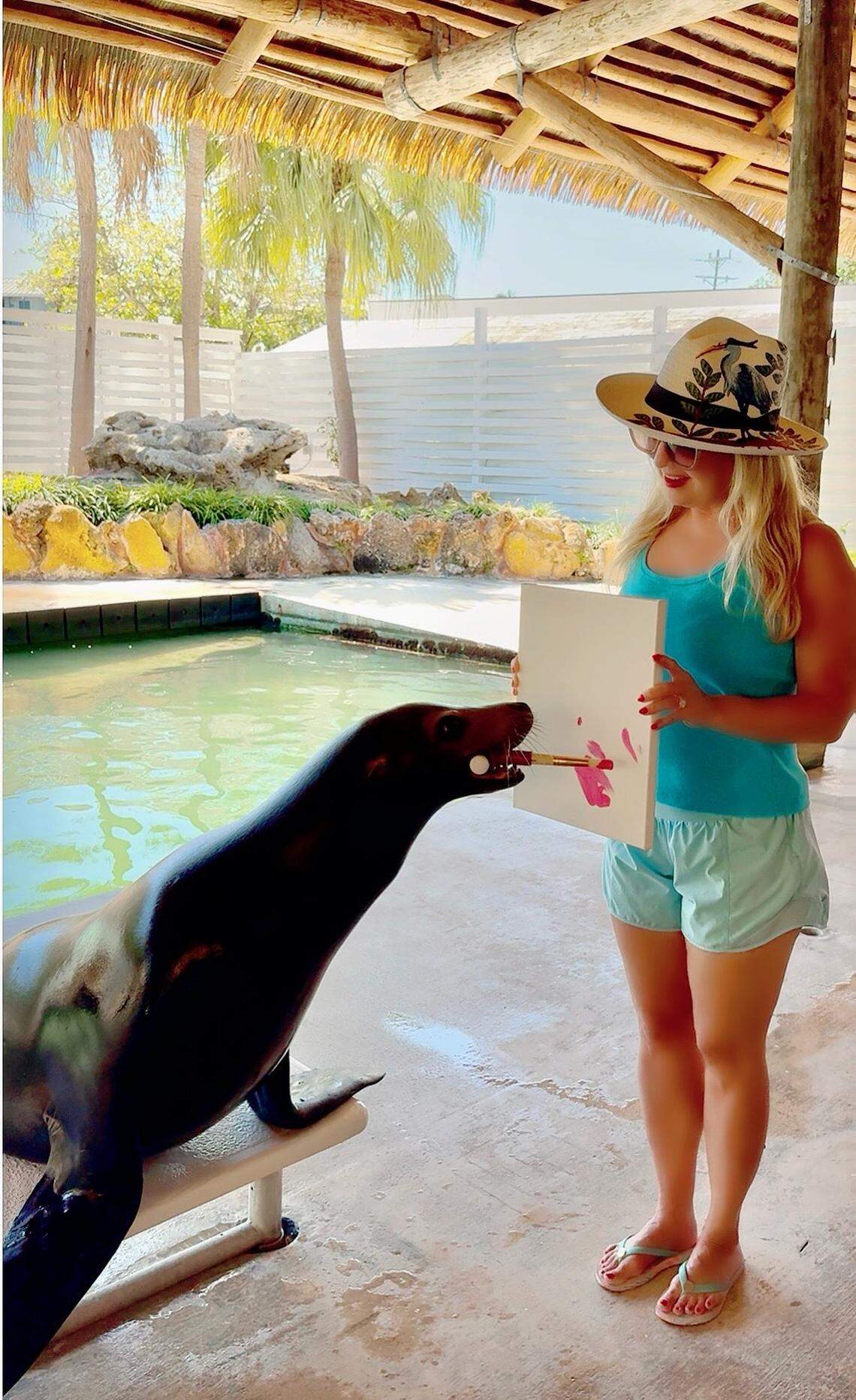 Meet Bella, the sea lion artist with a heart of gold and a brush in her mouth. Yes, you get to keep the masterpiece.