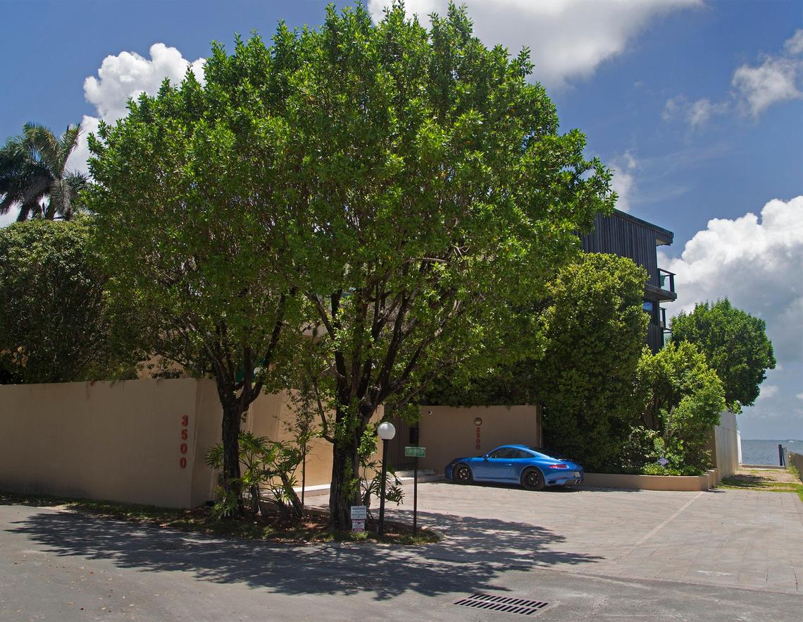 Alan, left, and wife, Alicia Sirkin live at the end of a Coconut Grove street that was the subject of a plan to make the neighborhood sea rise ready. The city paid for the plan, which includes unique ideas like building an island in the bay, installing porous pavement and buying out homes to turn the street into a conservation area. Pictured is the Sirkin's bay front home in Coconut Gove on Tuesday, June 26, 2018.